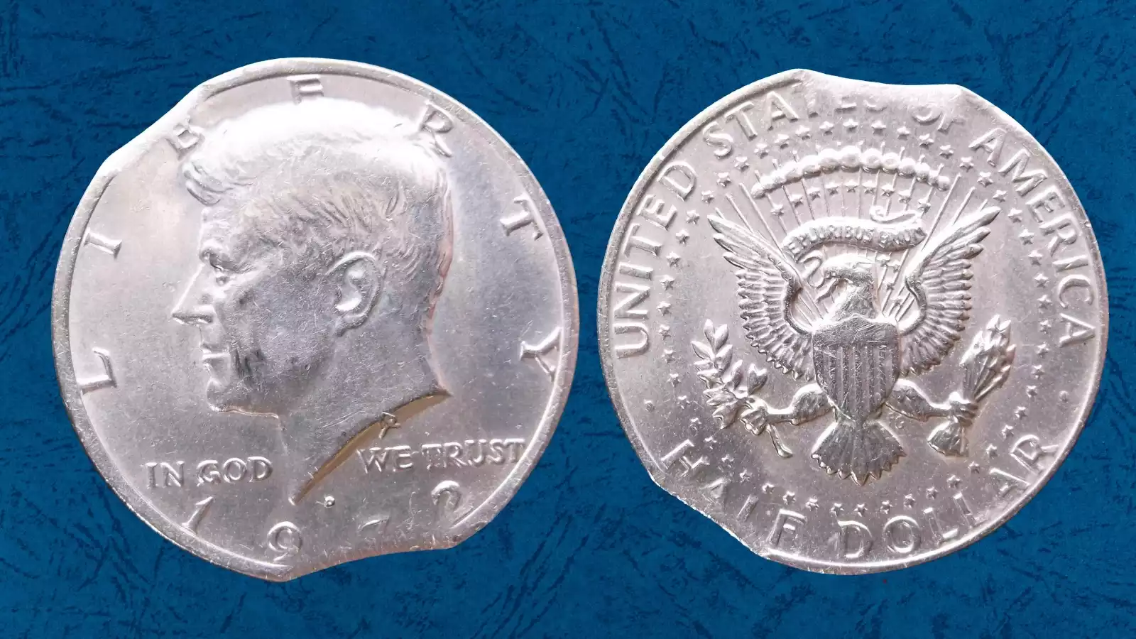 1972 Kennedy half dollar grading strip showing four condition tiers from heavily worn to gem uncirculated with strong cartwheel luster on MS-66 example