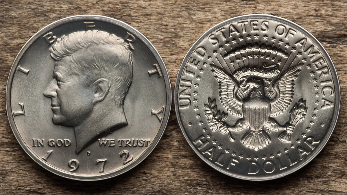 Spread of 1972 Kennedy half dollars showing Philadelphia no-mark, Denver D, and San Francisco S proof examples with mint mark locations annotated